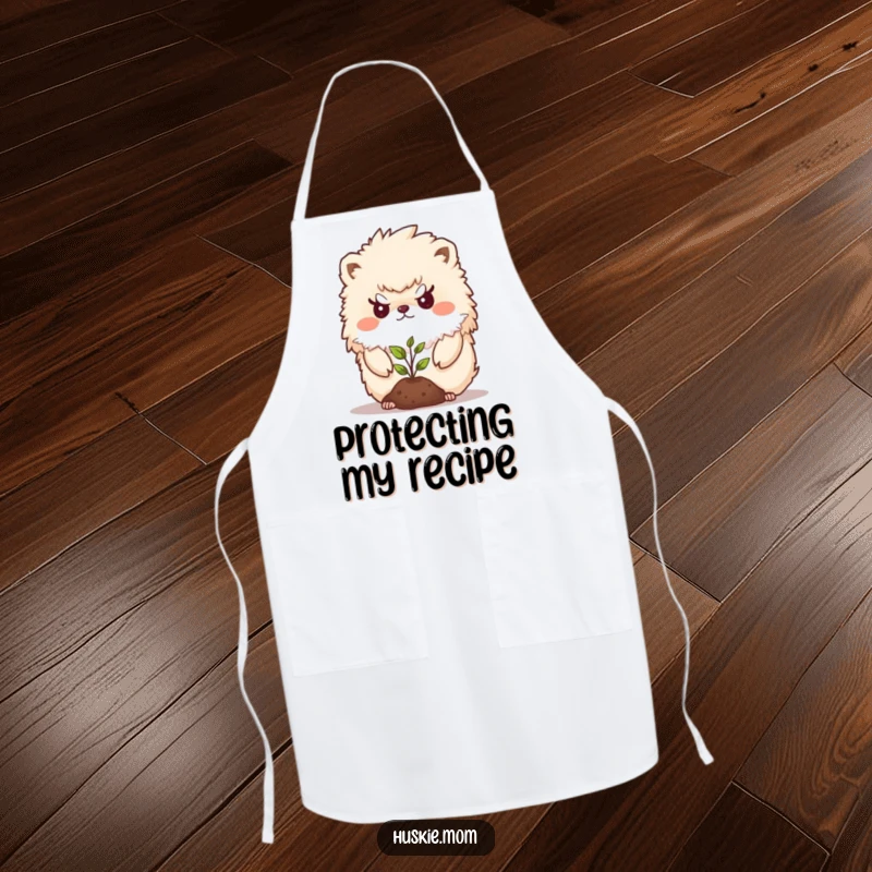 Funny Apron showing a fluffy animal with a determined look protecting a seedling, ideal for kitchen or garden protection.
