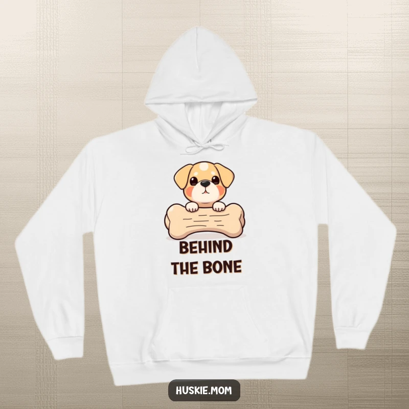 Peek-a-Boo Bone Dog Hoodie: A small, round dog character is hidden behind a huge bone, playfully peeking out with curiosity.