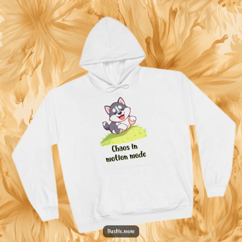 Funny hoodie depicting a gleeful husky puppy tumbling head over paws down a grassy hill, embodying playful energy and humor.