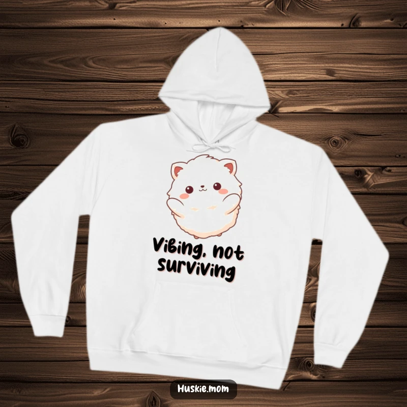 Funny hoodie with a fluffy animal exuding peace and joy, gracefully swinging back and forth with a contented smile.
