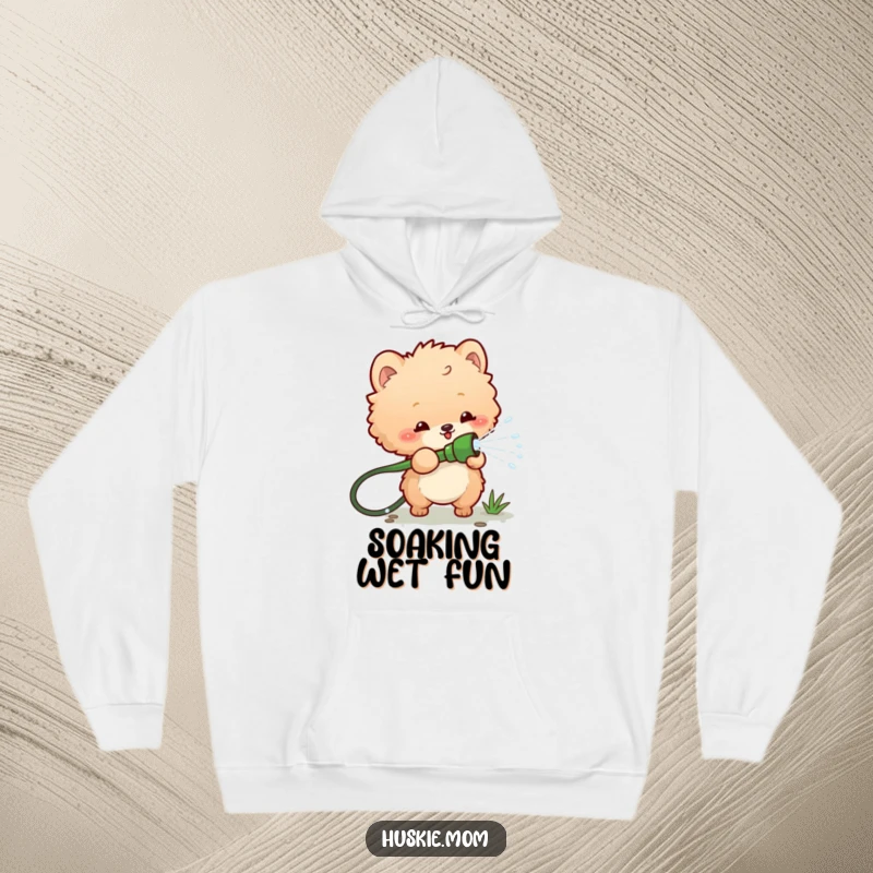 Funny hoodie depicting a fluffy animal playfully spraying water from a garden hose, perfect for staying warm while embracing a chaotic sense of humor.