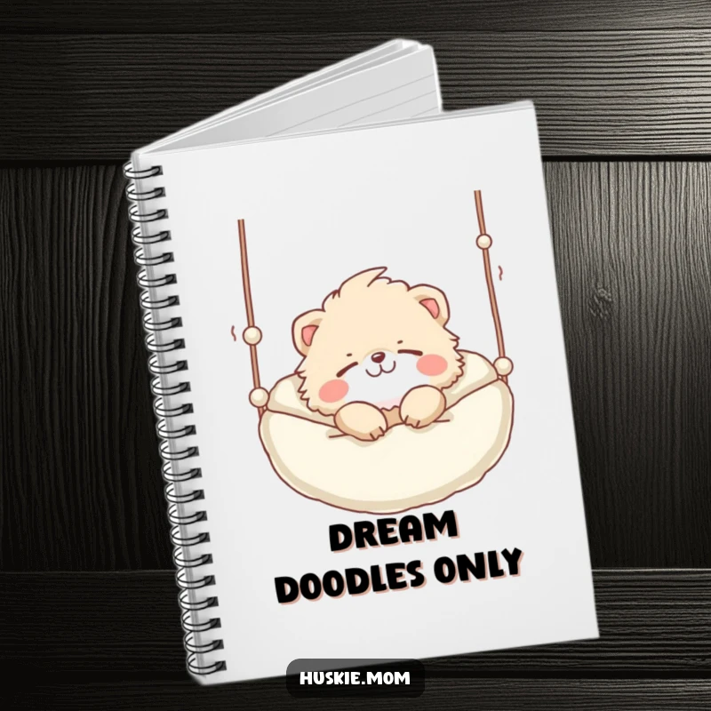 Funny Notebook: A fluffy animal with a playful grin sleeping soundly in a suspended bed, ideal for jotting down dreams.
