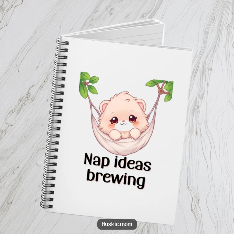 Funny notebook with a fluffy animal enjoying a hammock ride, perfect for jotting down thoughts and ideas.