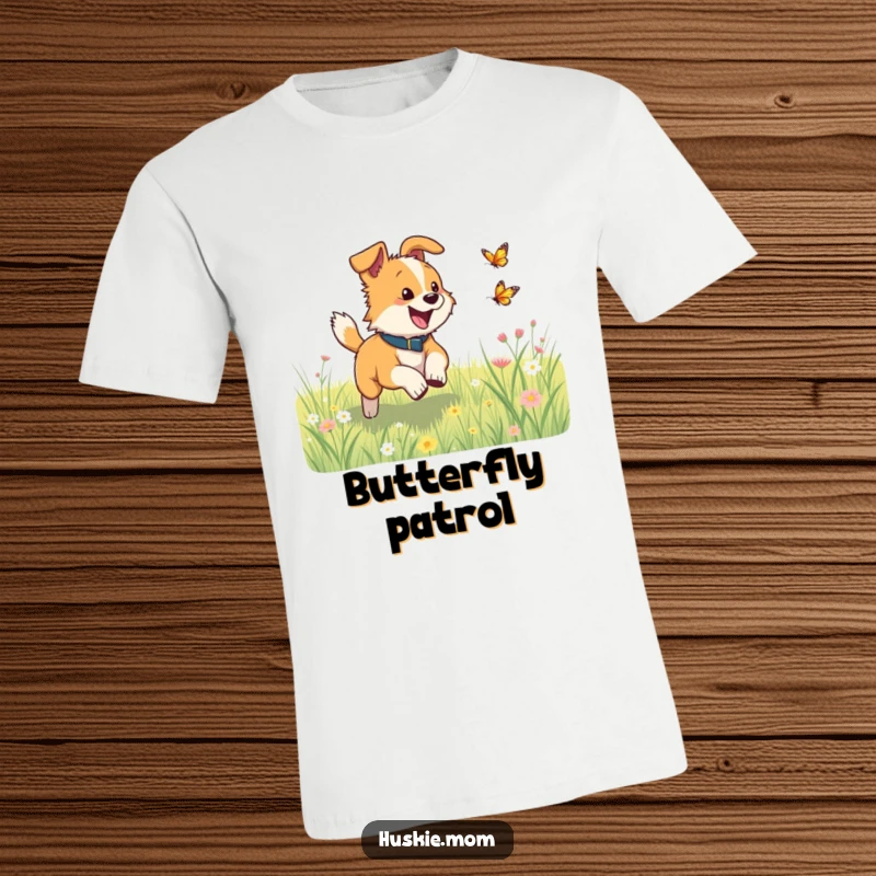 Funny dog excitedly chasing a small butterfly in a vibrant meadow on a t-shirt, showcasing boundless energy.