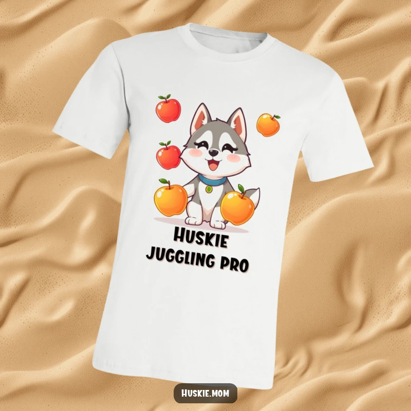 Funny t-shirt featuring a charming Husky lady animal comically attempting to juggle three shiny apples.