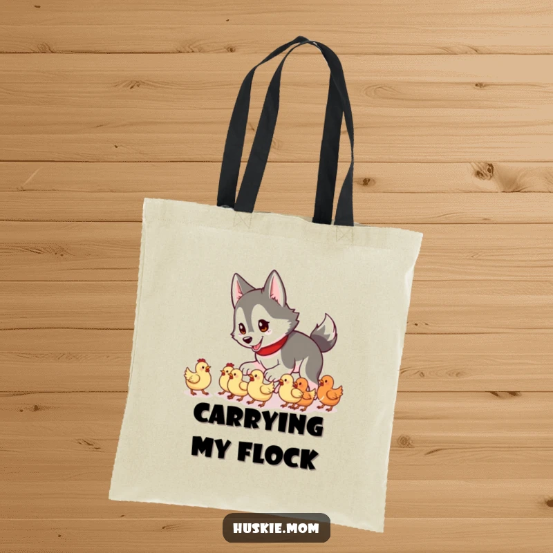 Funny Husky Lady Tote Bag showing a husky trying to herd a gaggle of tiny chickens, a humorous farm scene.
