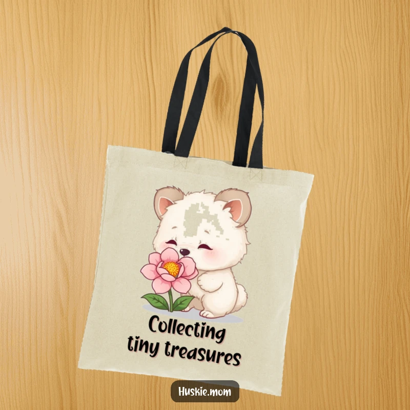 Funny Tote Bag: Sturdy bag with a fluffy animal curiously sniffing a flower, ideal for carrying groceries with a touch of humor.